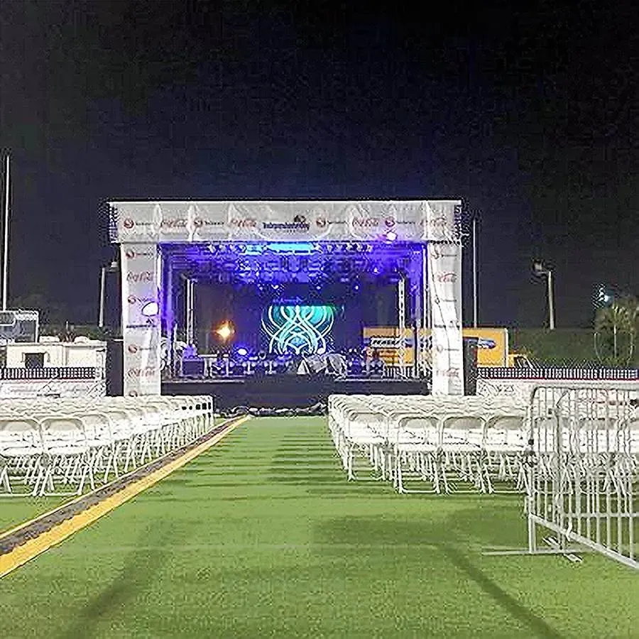 APEX 3224 stage lit at an evening event