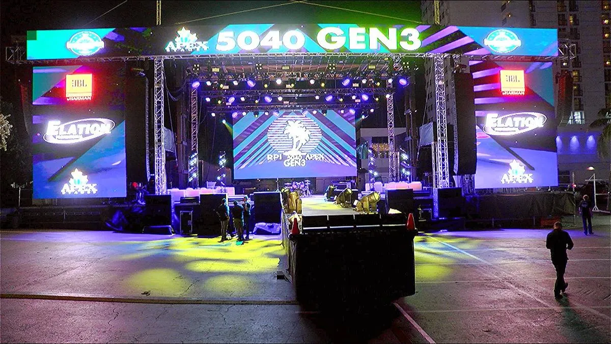 APEX 5040 GEN3 stage at night with full LED wall and lighting rig